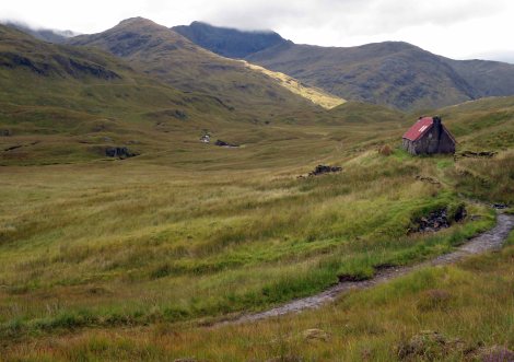 Camban Bothy as rain clouds touch the summit of the hills